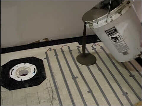 Heated Flooring Installation with cement pouring in Dorval, West Island